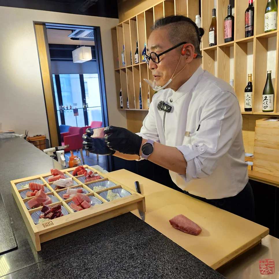 Bangyi-dong Gold Tuna chef preparing tuna omakase dishes, culinary expertise