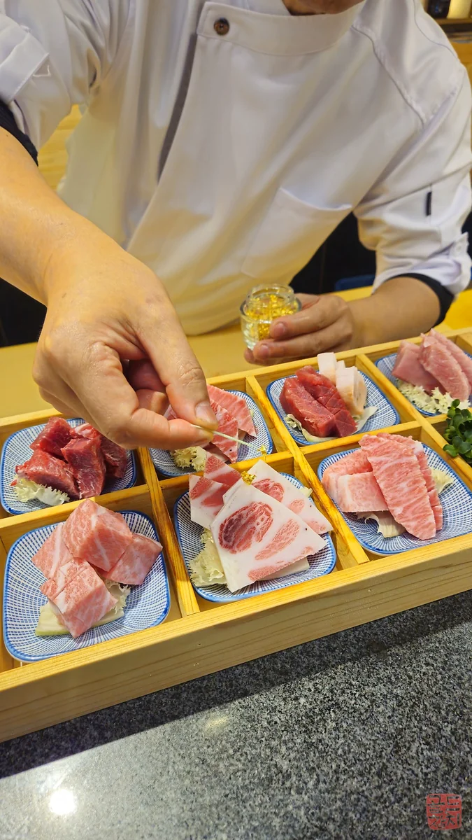 Bangyi-dong Gold Tuna premium tuna sashimi with gold flakes, luxurious plating