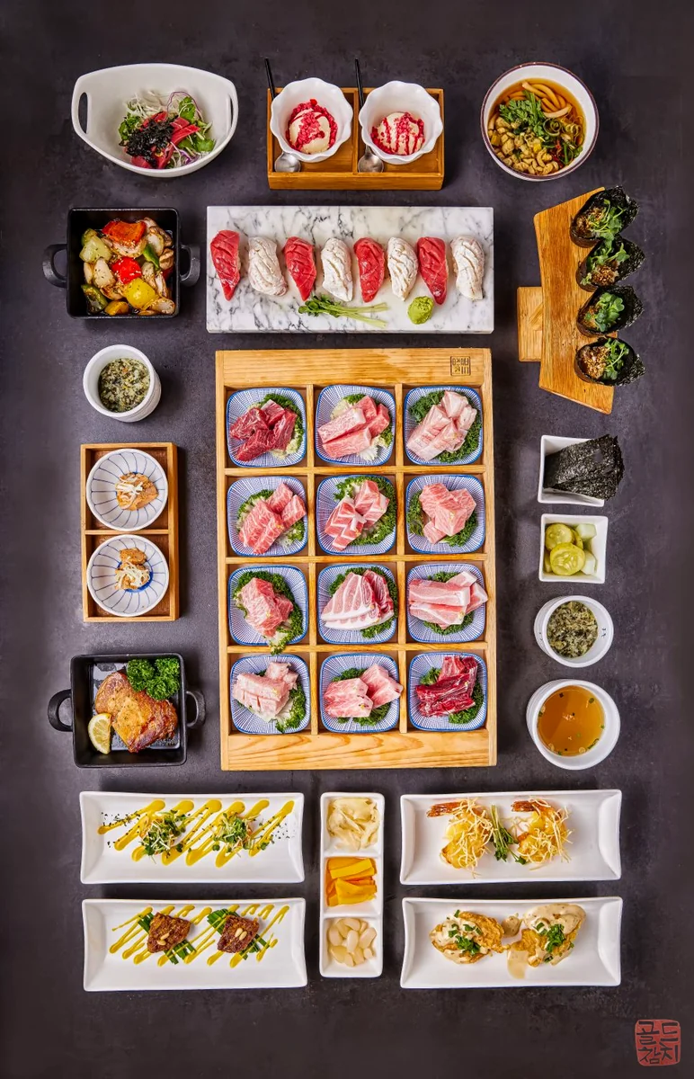 Gold Tuna 15-course omakase full table setting, generous presentation