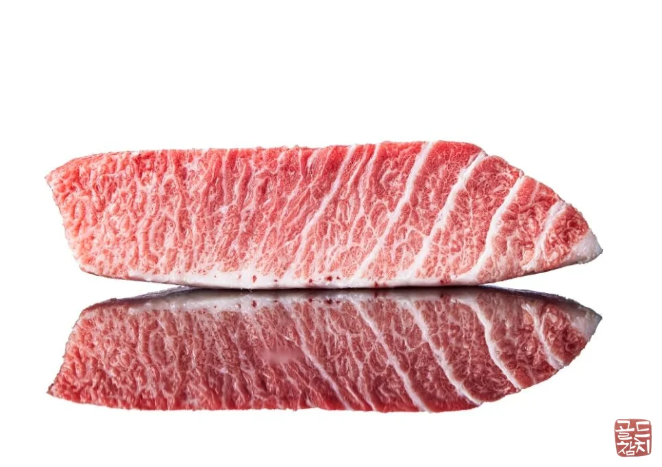 Preparing top-grade No. 1 Toro of Bluefin tuna at Goldtuna
