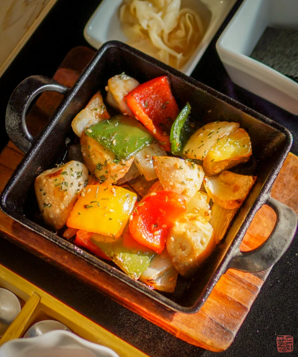 Goldtuna side dish grilled mushrooms on hot plate