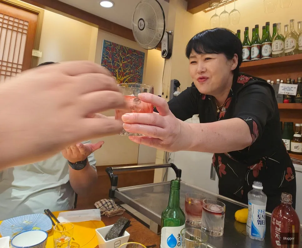 Seoul Gold Tuna SoMaek Imo's Bokbunja smoothie, unique customer experience, signature drink